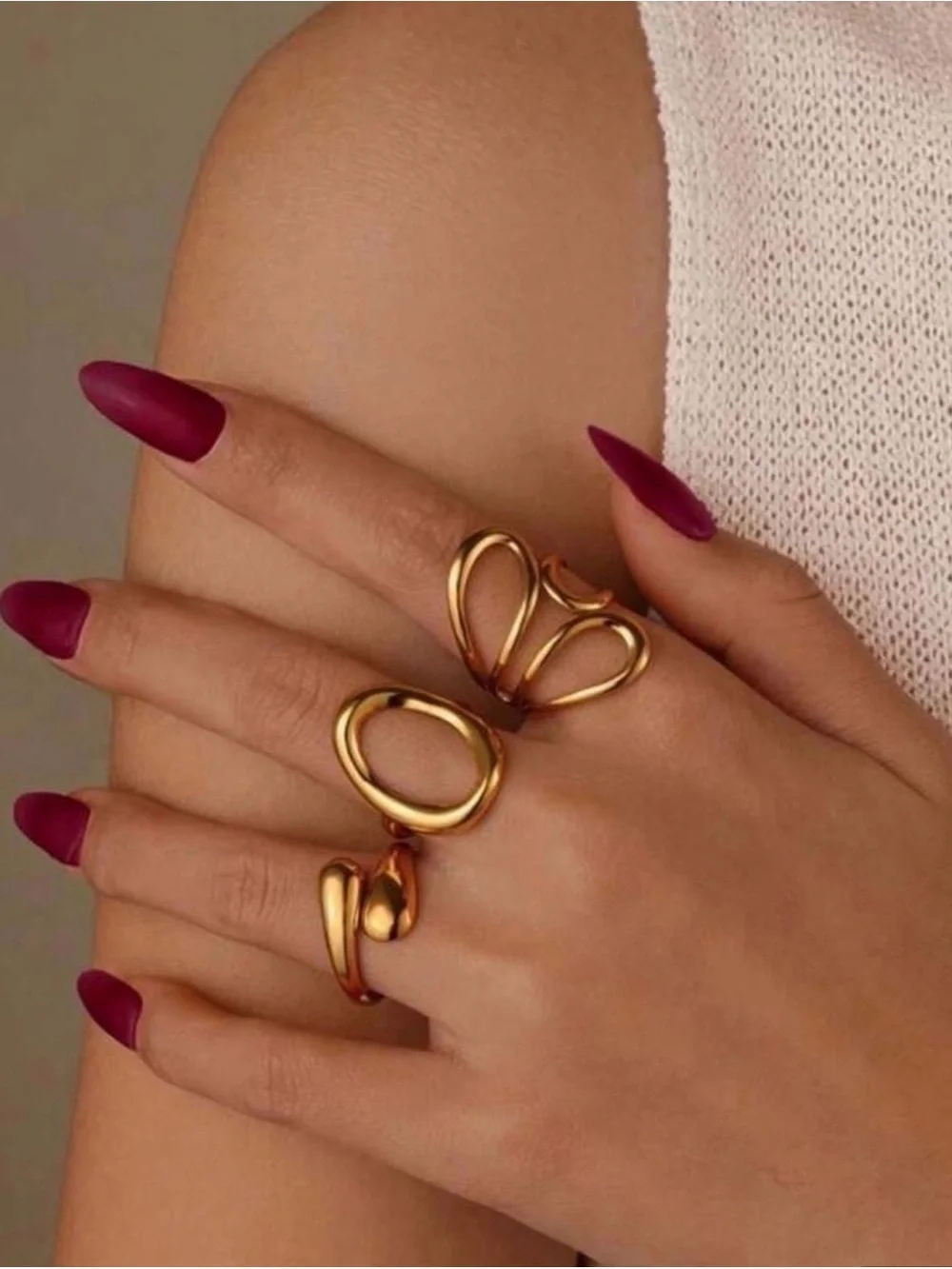 Gold Sculptural Open Ring Trio with Matte Burgundy Nails